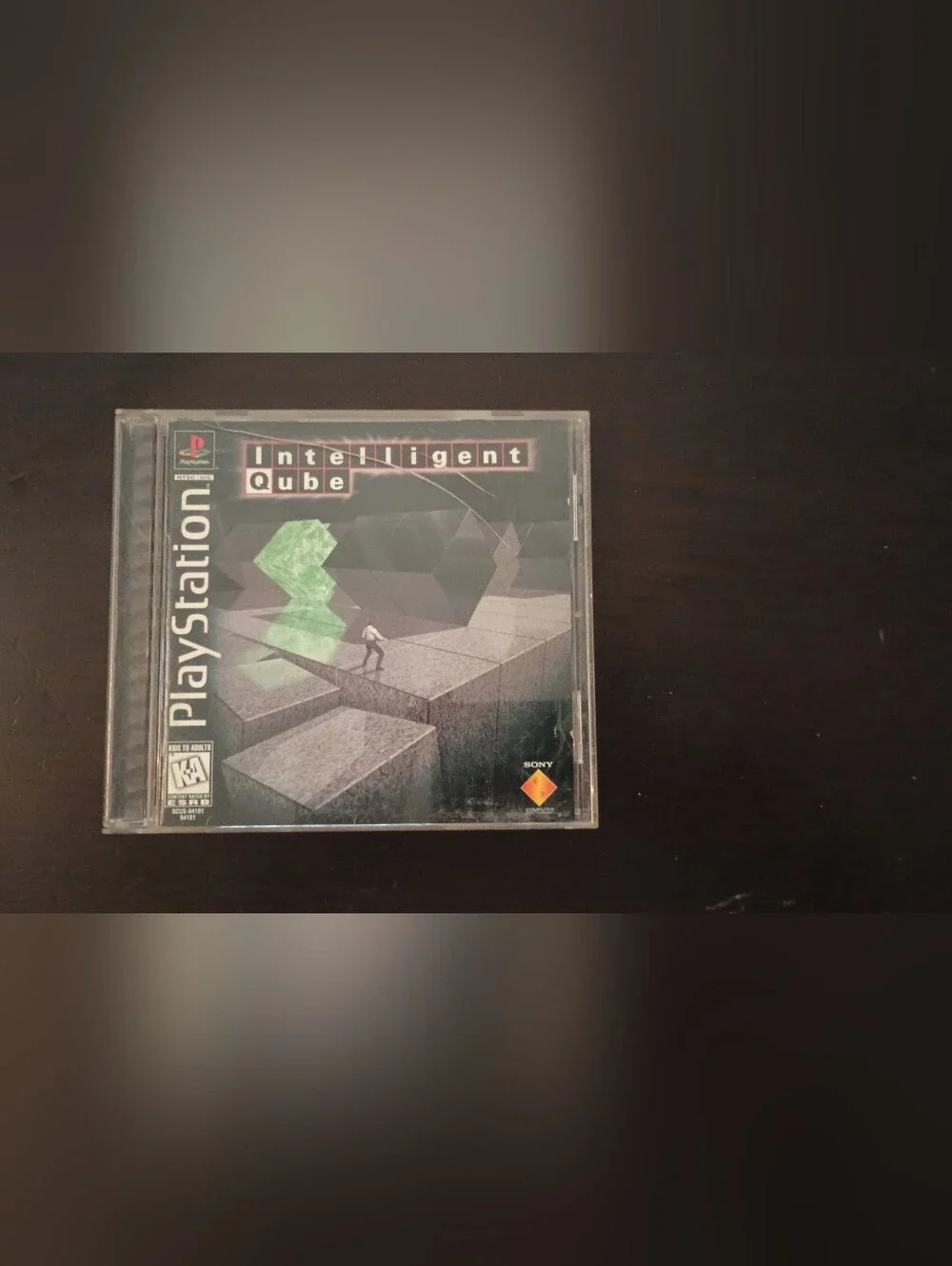 Sony Ps1 Intelligent Qube Cib— Black & Green Cover Art